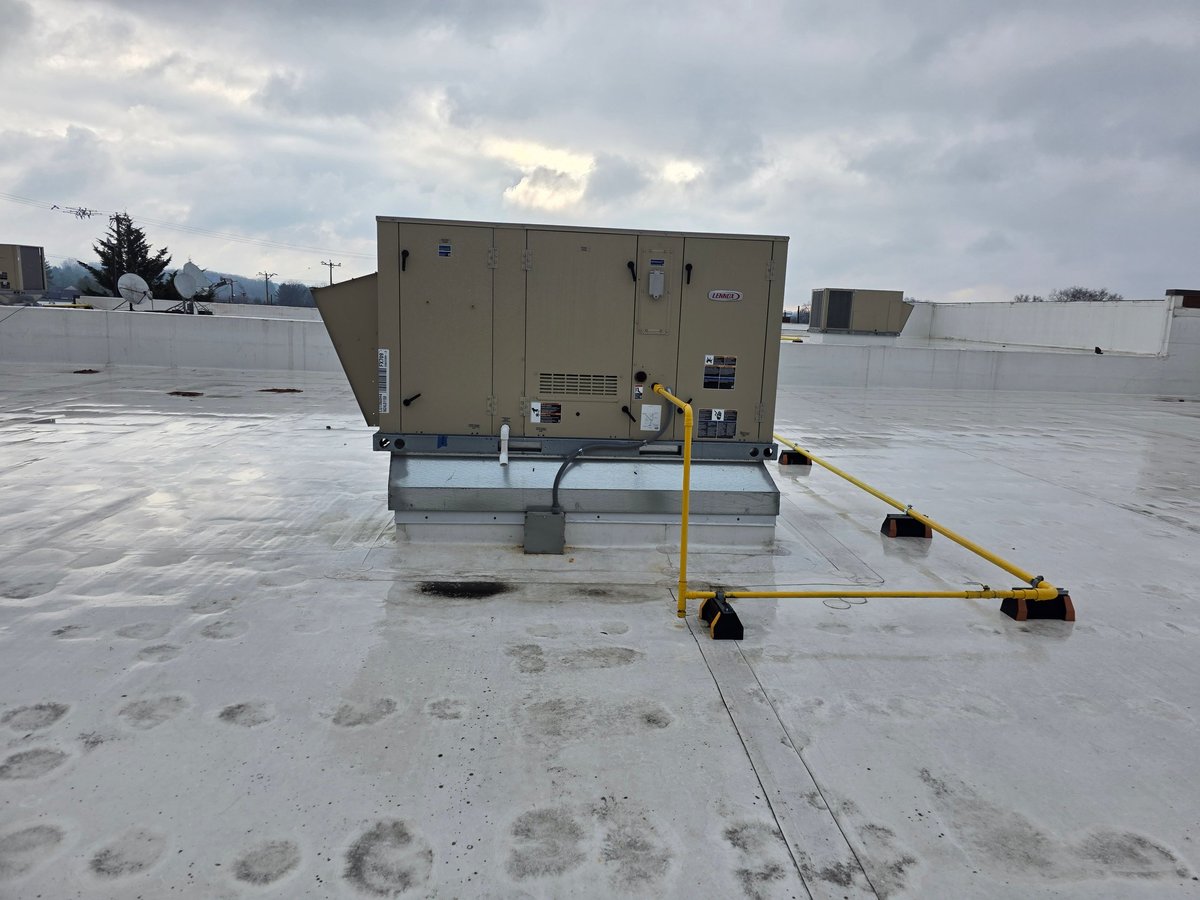 Rooftop HVAC unit serviced by Clark's Heating and Cooling on a commercial building